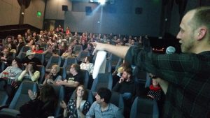 Garrett Johnson (right) during a REWIND event at the Robinson Film Center.